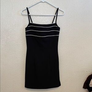 Chic Black Mini Dress with White Trim